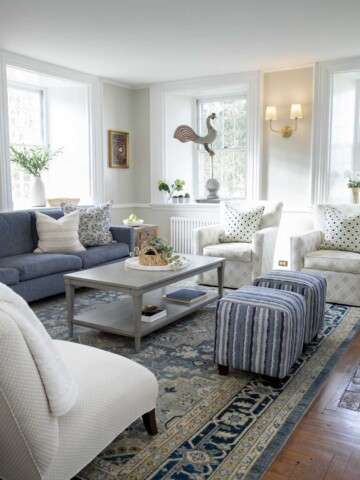a living room with blue and white