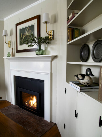 Tapestry Beige paint on a wooden wall with a white dove mantle