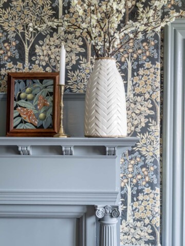 brewster gray paint on fireplace mantle with wallpaper