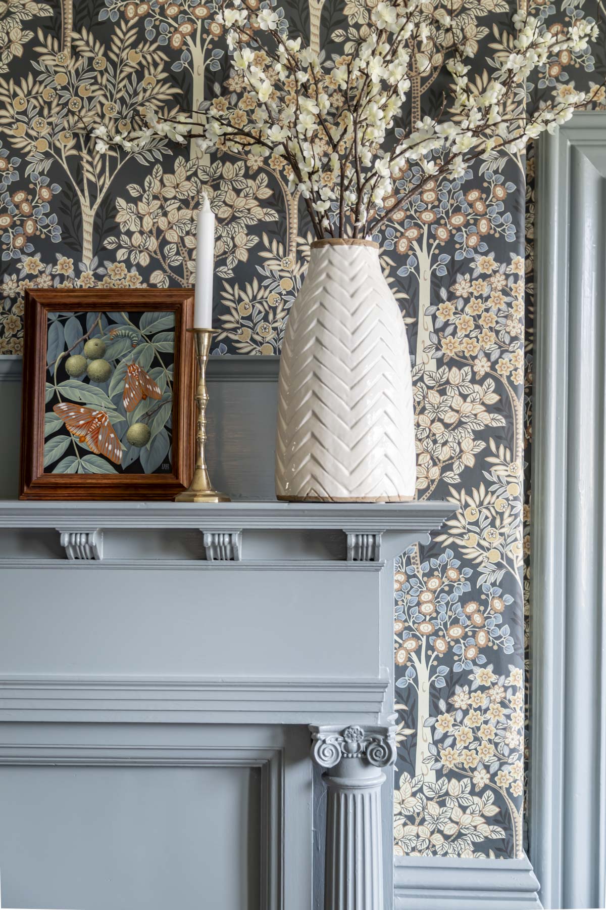 brewster gray by ben moore on our mantle with a gold and blue wallpaper pattern