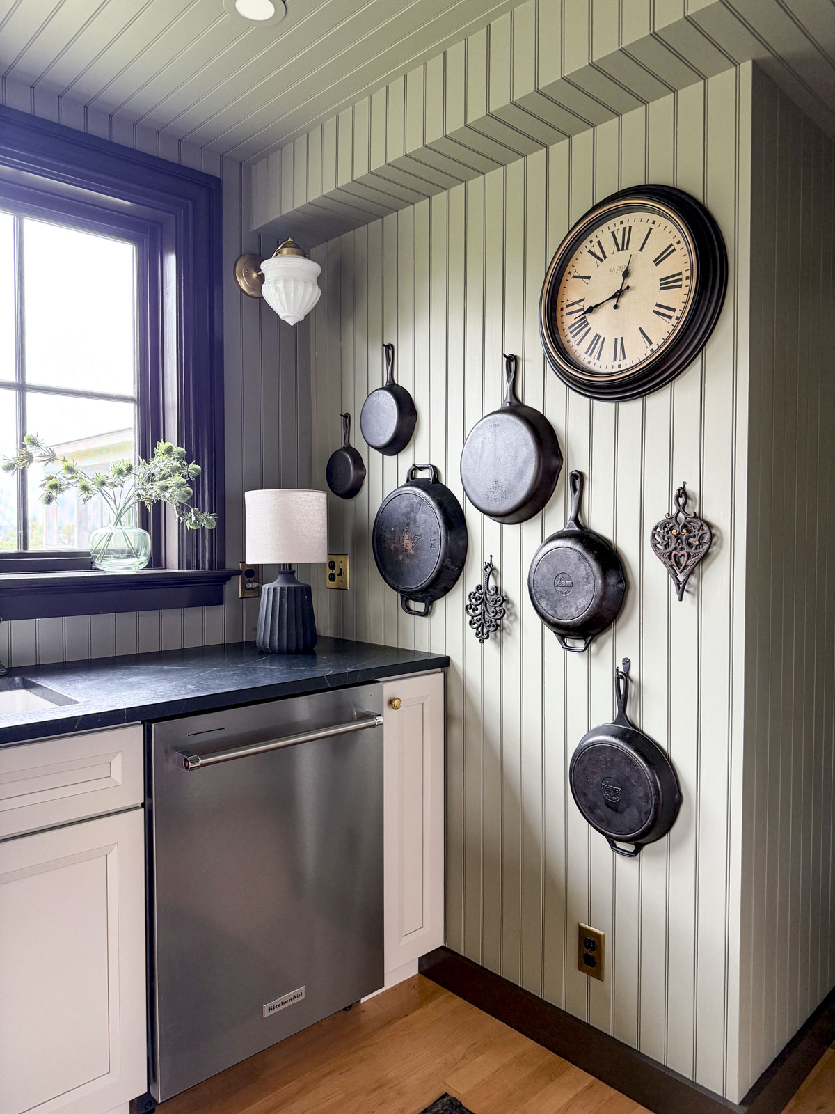 the apartment kitchen wall with green paint on it