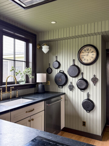 creekside green kitchen with dark brown trim