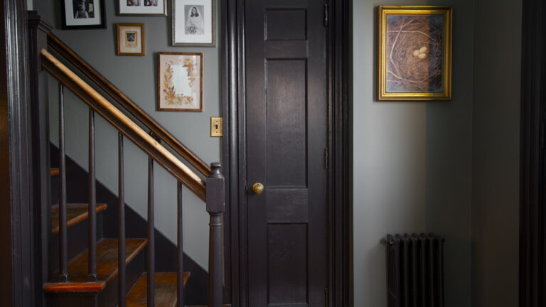 the back stairwell and entryway to our in-law apartment painted in Bucktrout Brown and Antique Pewter