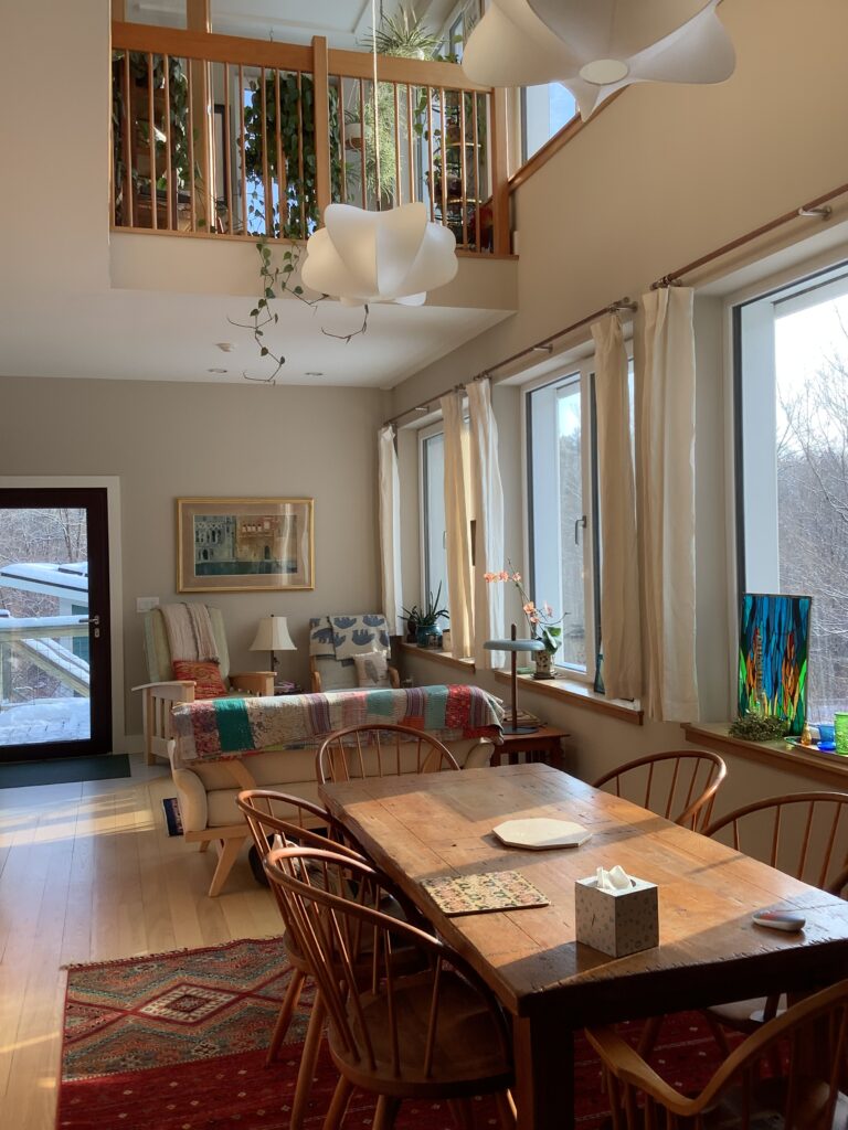 Their living room is two stories high with southern exposure. This makes the Accessible Beige feel warm without going yellow