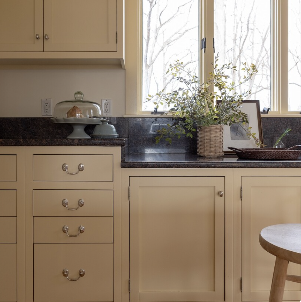 Farrow's Cream on kitchen cabinets is the lightest of our selections- detail close-up in darker spot without any artificial light