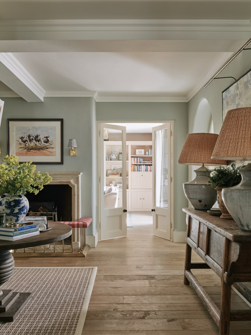 Sims Hilditch design with a soft duck egg blue wall color